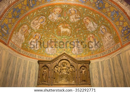 JERUSALEM, ISRAEL - MARCH 3, 2015: The mosaic of The Lamb of God among the saints in side apse of Dormition abbey by Benedictine Radbod Commandeur from the Benedictine Abbey of Maria Laach - 20. cent.
