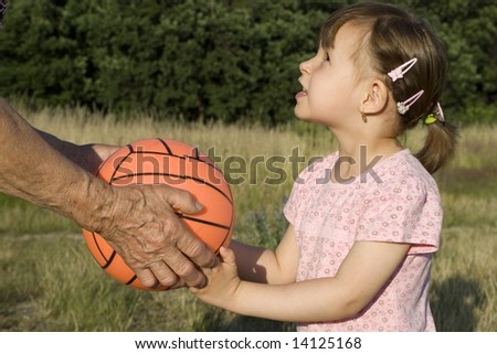 hands of garandmother and ball