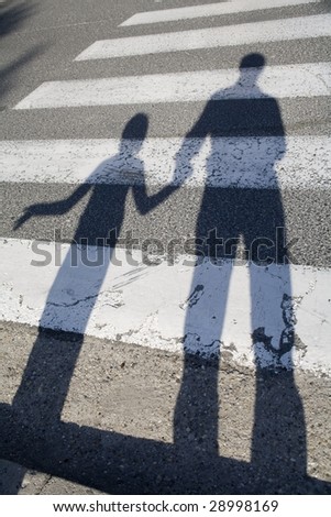 shadow of father and child by the way