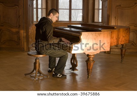 piano player in old castle