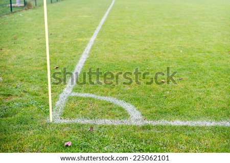Corner marking on a grass covered soccer field.