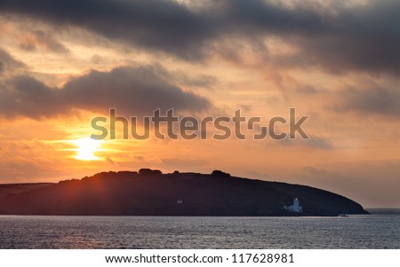 Sun rising over St Antonys Head taken from Pendennis Head Falmouth Cornwall England UK