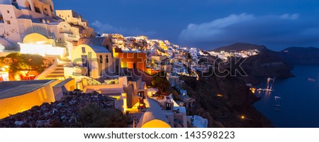 Night shot of the caldera in the town of Oia Santorini Greece