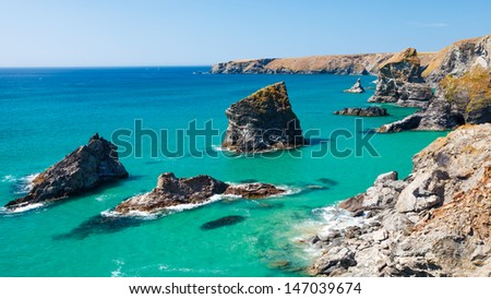 Summers day and turquoise sea at Bedruthan Steps Cornwall England UK