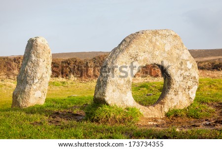 The Men-an-Tol is thought to date to either the late Neolithic or early Bronze Age. Located on Penwith Moor Cornwall England these standing stones are steeped in myth and legend.