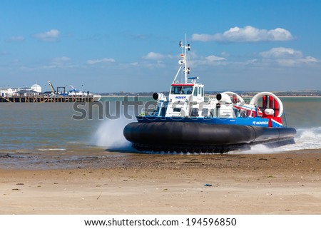 RYDE, ISLE OF WIGHT, UK - APRIL 18, 2014: The Hovercraft service between Ryde on the Isle of Wight and Portsmouth arriving at Ryde.