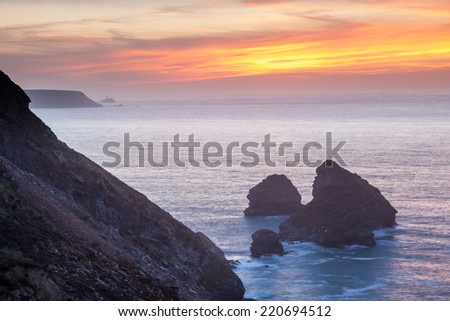 Sunset over cliffs at Bassetts Cove North Cliffs Cornwall England UK Europe