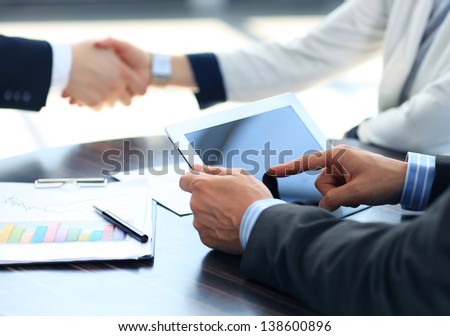 Businessman Holding Digital Tablet
