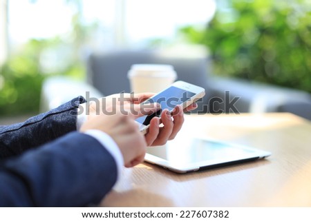 Modern workplace with digital tablet computer and mobile phone