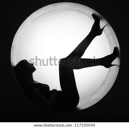 stylish silhouette beautiful woman in circle