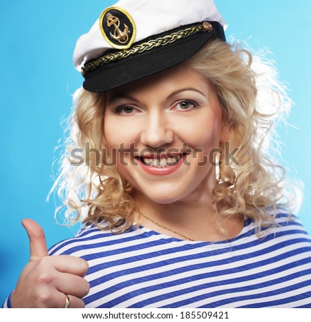 Happy blond woman on blue background