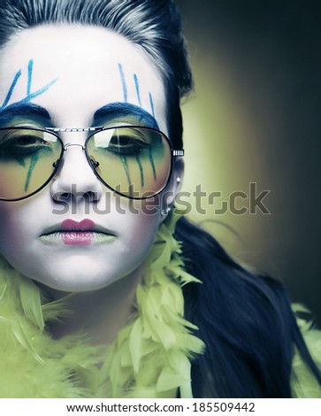 close up of a face of a girl with creative visage