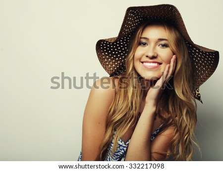 Beautiful woman in  straw summer hat