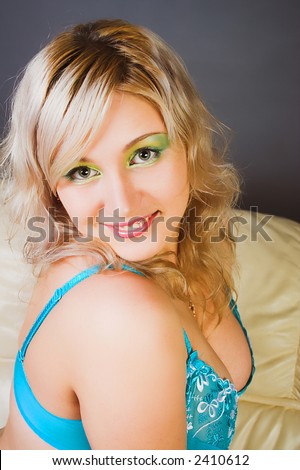 Beautiful young woman with magic green  eyes smiling