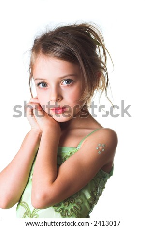stock photo a little innocent girl in green dress