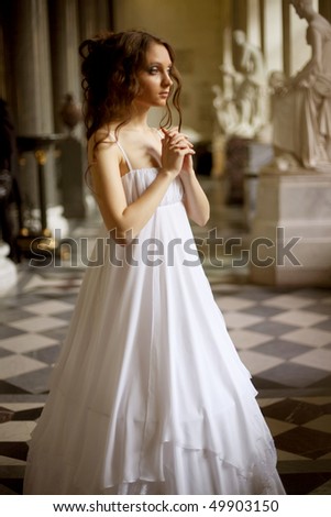 Beautiful happy young bride with long brown hair