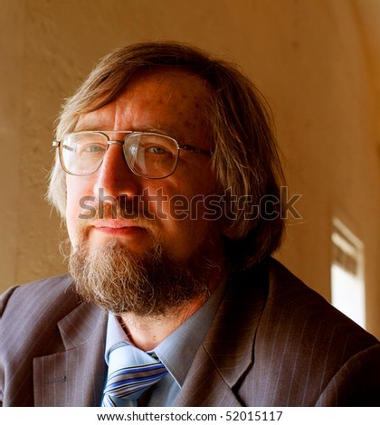 Closeup portrait of a senior mature professor