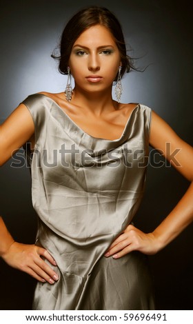 Beautiful fashion model on black background