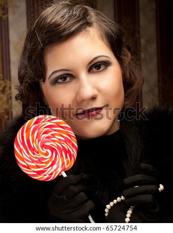 vintage girl with  red lollipop