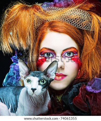 yong princess with cat. creative fantasy make-up.