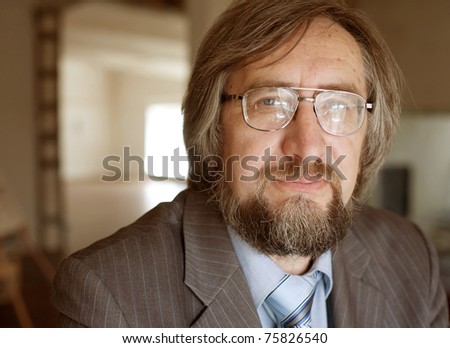 Closeup portrait of a senior mature professor