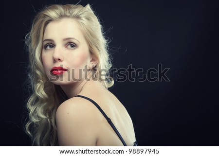 sexy blonde on black background