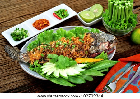 Crispy snake-head fish in chili paste and thai herb (plah-pla-chon-krob)