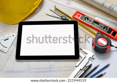 Tablet computer with architecture and construction tools and blueprints