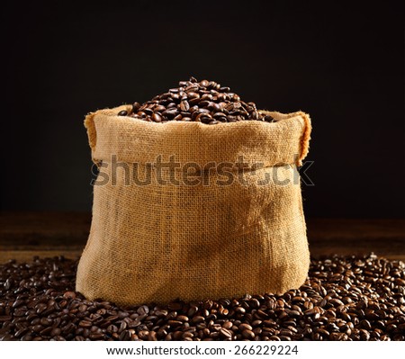 Coffee beans in burlap sack, This photo is available with smoke