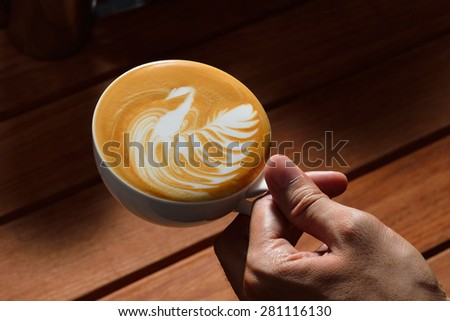 Making of cafe latte art, bird shape