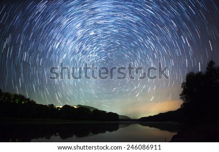 a beautiful night sky, Milky Way, star trails  and the trees