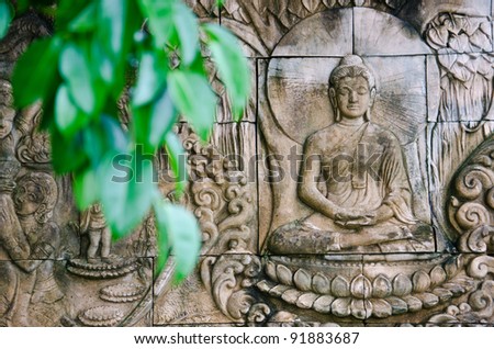 Stone carvings of Buddha become enlightened under the tree