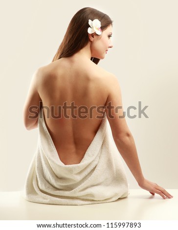 beautiful lady with white towel on white background