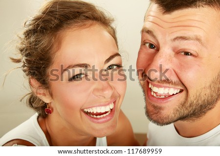 Young man and woman together over white background