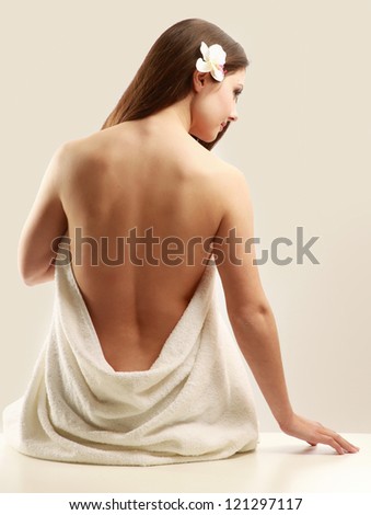 beautiful lady with white towel on white background