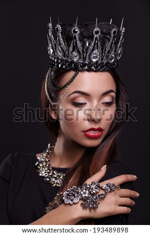 woman in black crown