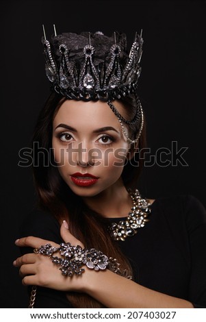 portrait of woman in black crown