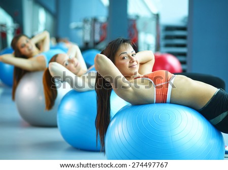Group of people in a Pilates class at the gym