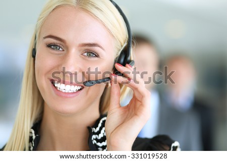 Portrait of  support phone operator with the headset