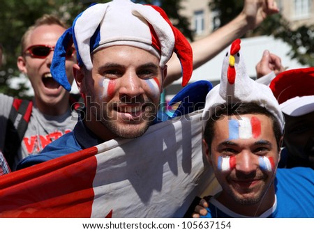 KYIV, UKRAINE - JUNE 19 2012: Official fan zone  on Khreshatyk street. France football fans before start match Sweden - France, Group D.   EURO 2012 in Kyiv, 19 june 2012.