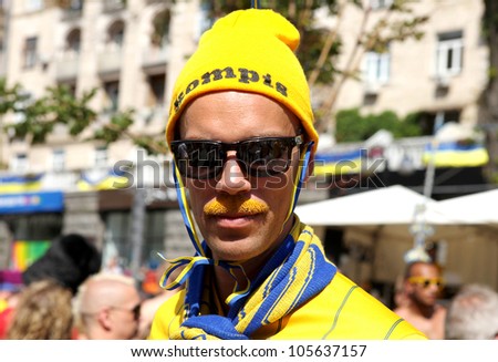 KYIV, UKRAINE - JUNE 19 2012: Official fan zone on Khreshatyk street.  Sweden football fan before start match Sweden France, Group D.  EURO 2012 in Kyiv, 19 june 2012