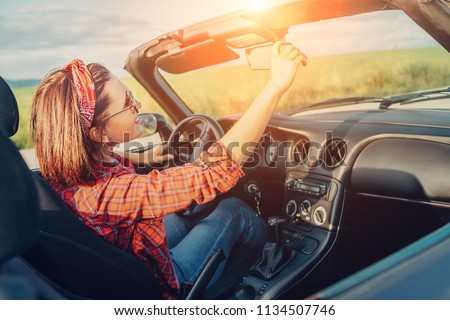 Woman drive cabriolet