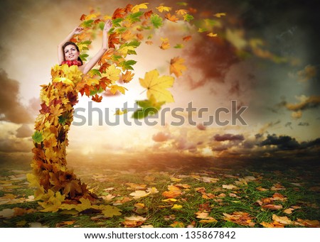Lady Autumn with wings from falling leaves