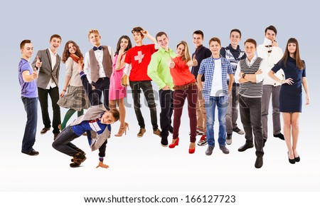 Large group of happy multicolored dressed teenagers