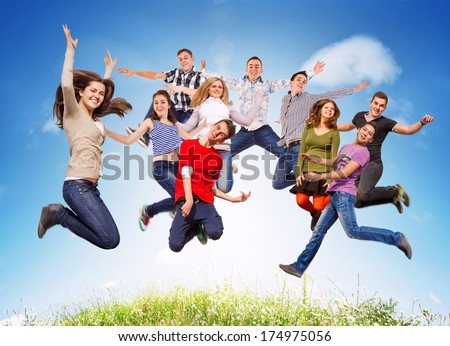 Group Happy Young People Jumping In Sky