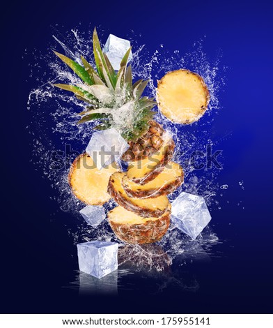 Sliced Pineapple falling in water drops with ice cubes