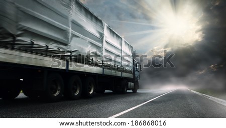 Big tented truck on the lonely highway