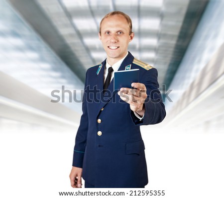 Airport service man with documents on the flight in hand