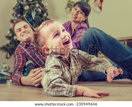 Happy family at home in christmas time