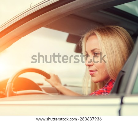 Young woman drive a car